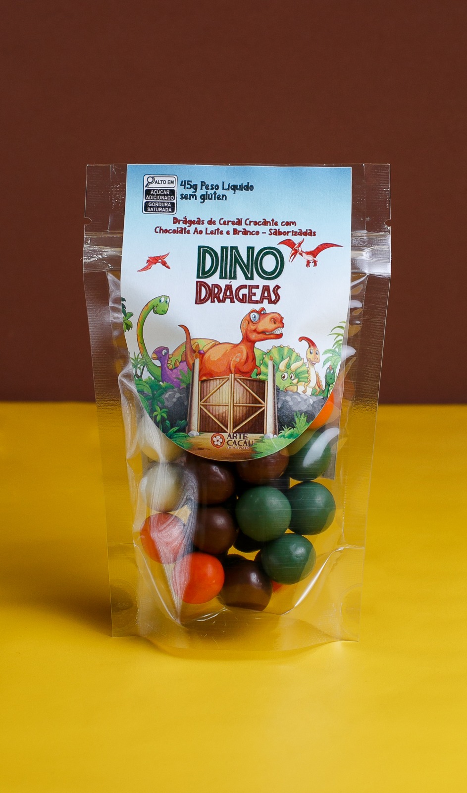 Pacote Dino Drágeas com drágeas de cereal crocante coloridas