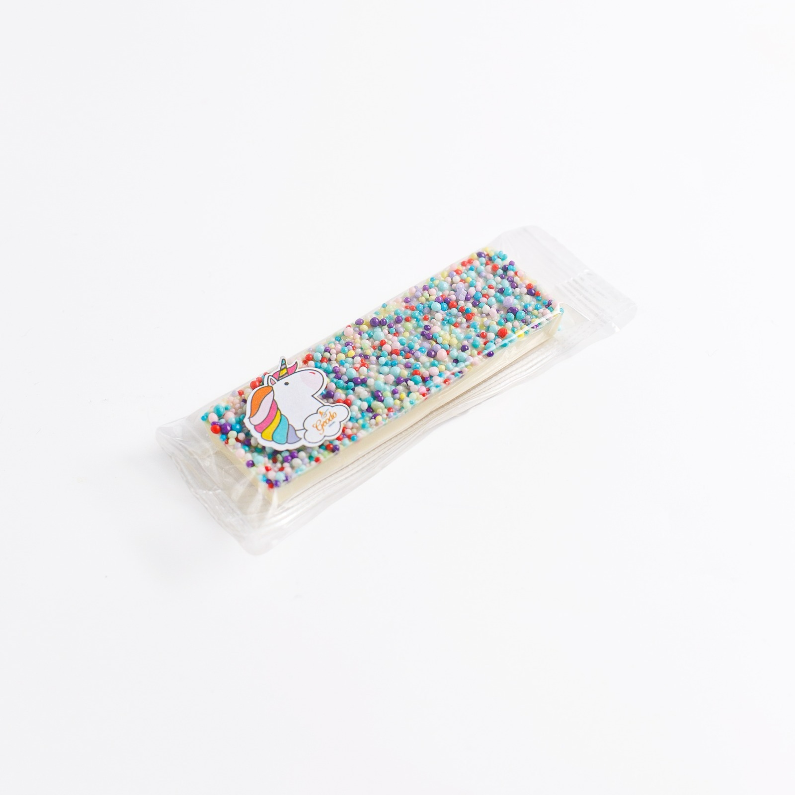 Barrinha de chocolate branco com confetes coloridos, embalada individualmente